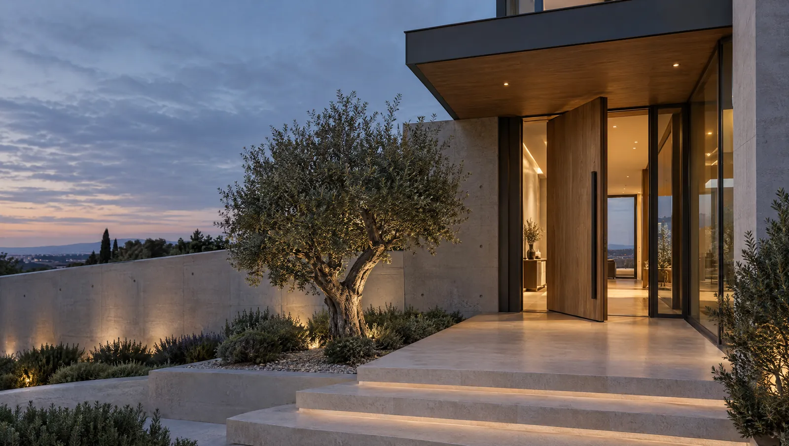 Entrance of a contemporary home at dusk with an open oak door